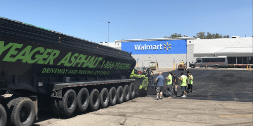 Yeager Asphalt paving a large Walmart Parking lot. 