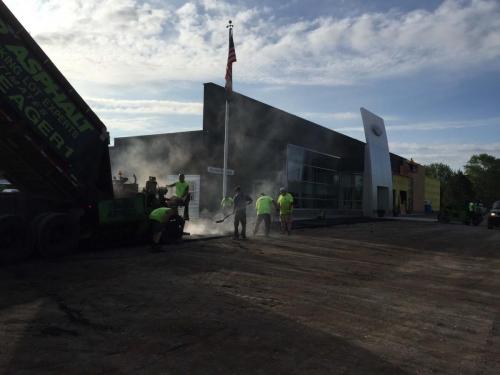 Yeager Asphalt crew repairing a parking lot. 