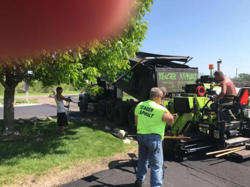 Yeager Asphalt paving a driveway. 