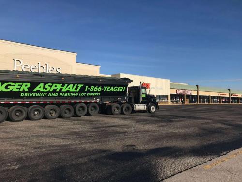 Yeager Asphalt repairing and paving parking lot. 